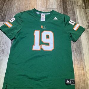 UM Adidas jersey #19 Kids size L color Green